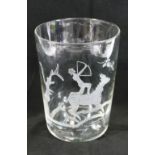 A large hand blown straight sided clear glass vase, with engraved design of an archer on horseback,