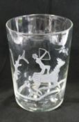 A large hand blown straight sided clear glass vase, with engraved design of an archer on horseback,