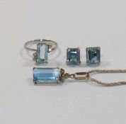 A matched aquamarine and diamond suite of jewellery comprised of a ring, finger size M,