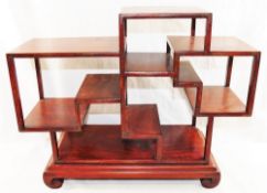 A set of 20th century Chinese table top hardwood shelves, inlaid with wire, 33cm x 15cm x 42.