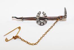 A Victorian bi-colour diamond set riding crop and horseshoe brooch,