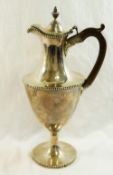 THIS LOT HAS BEEN WITHDRAWN - A large 19th century Neo-Classical shaped hotwater jug,