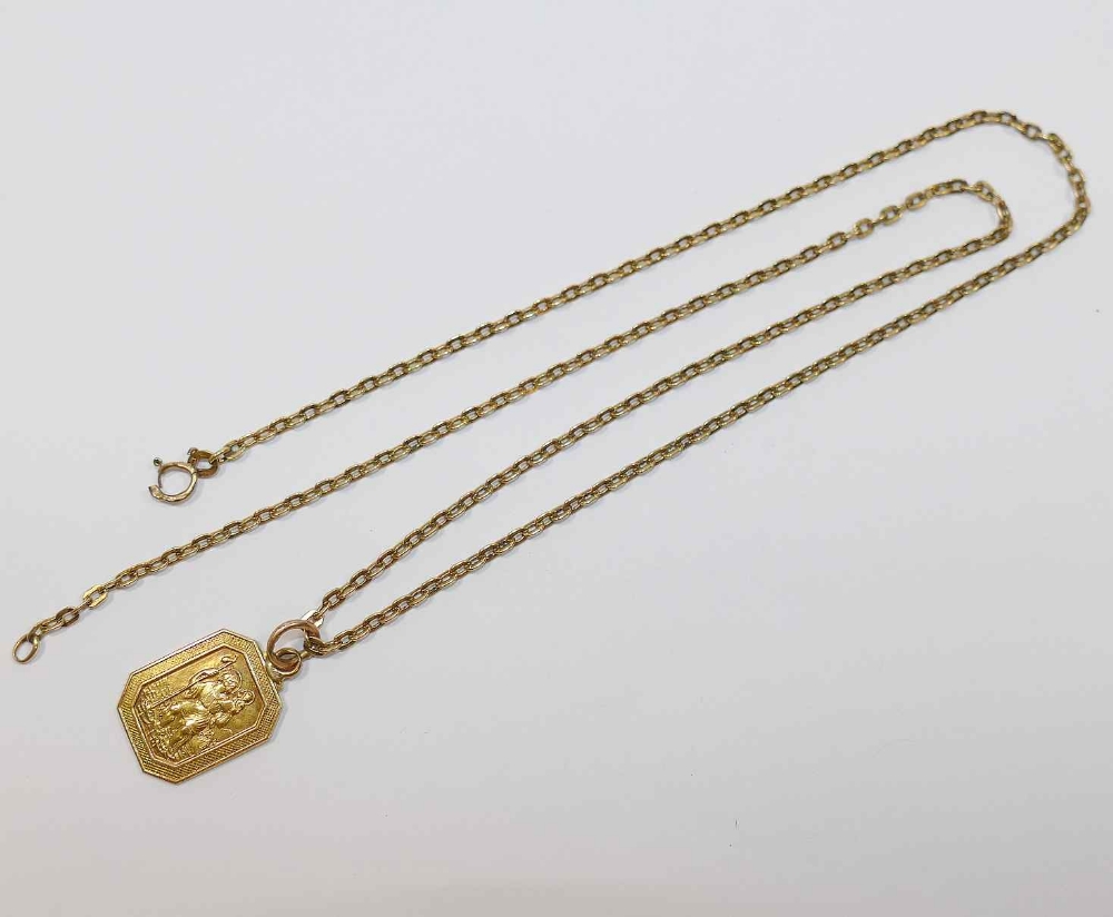 A yellow metal Saint Christopher pendant stamped '750' and an Italian yellow metal chain also