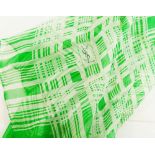 A Yves Saint Laurent green and white silk chiffon scarf with crossed thread pattern and YSL