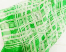 A Yves Saint Laurent green and white silk chiffon scarf with crossed thread pattern and YSL