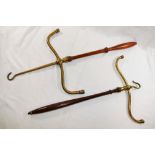 Two barrister's gown/wig hangers with turned handles, one having been reversed, 51cm and 64.