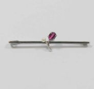 A 20th century white metal bar brooch stamped '9CT',