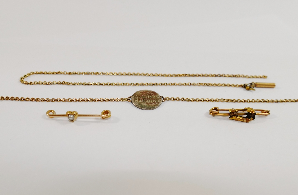 Yellow metal items comprised of a chain and two small bar brooches, all at fault, 10. - Image 2 of 3