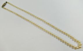 A string of Mikimoto individually knotted cultured pearls, with white metal clasp stamped '10K',
