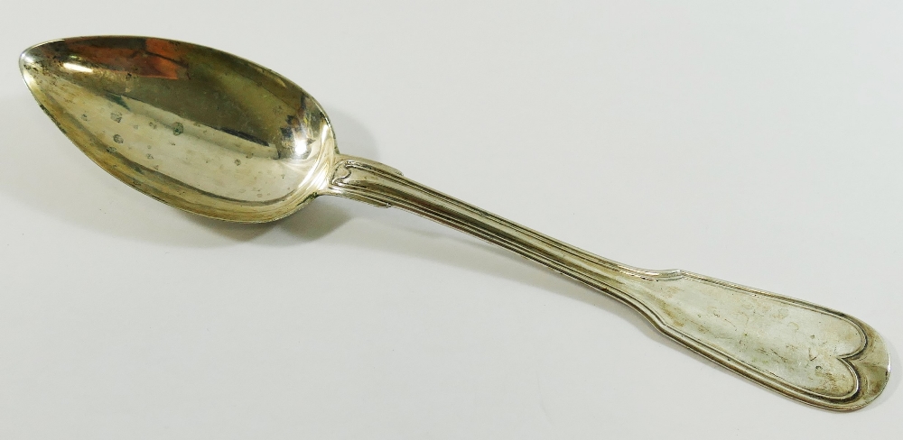 A single 19th century European silver coloured metal fiddle and thread pattern table spoon,