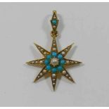 A Victorian gold, half seed pearl and turquoise set star pendant, stamped '15CT', 3cm long,