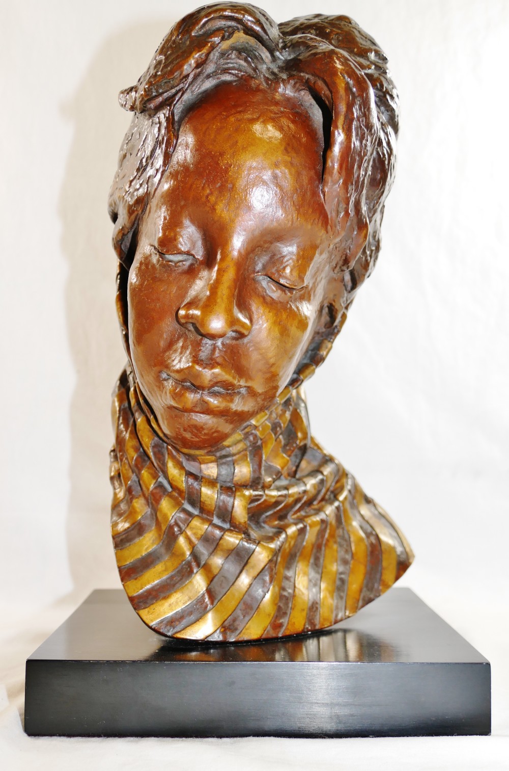 A head study of an African lady wearing a scarf, bronze with gilt detail, on rectangular plinth, - Image 6 of 8