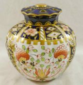 An early 20th century Royal Crown Derby Imari pattern lidded pot pourri vase,