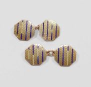 A pair of octagonal engine turned and enamelled yellow metal cuff links stamped '9CT', 5.