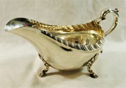 A late Victorian silver gravy boat, Sheffield 1899, by Roberts and Belk,