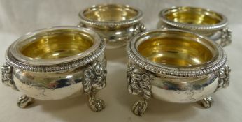 A set of four George III circular silver salts, London 1820, by Robert Hennell,