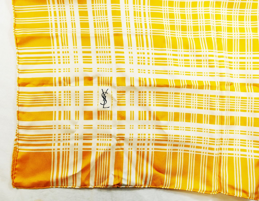 An Yves Saint Laurent yellow and white silk scarf with crossed thread pattern and YSL monogram to - Image 2 of 4