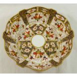 An early 20th century Royal Crown Derby Imari pattern high sided dish with red printed factory mark