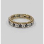 A 9 carat gold bi-colour sapphire and diamond eternity ring,