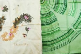 A Christian Dior silk scarf, decorated with a stylised feather and flower petal 'Paris' design,