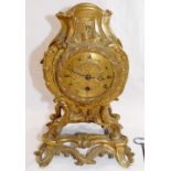 A 19th century gilt brass Rococo style mantle timepiece,