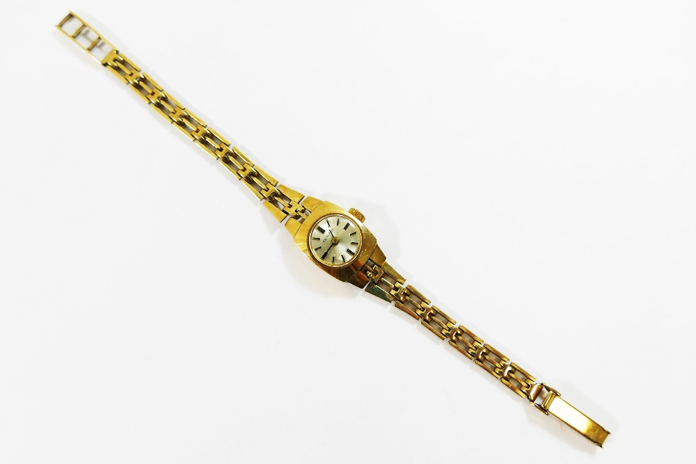 A ladies 'Excaliber' 9 carat gold bracelet watch, the round face with baton numerals, - Image 2 of 3