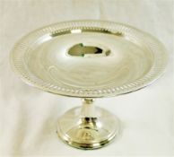 A Edwardian silver pedestal dish, Birmingham 1907, with pierced rim and loaded base, 10cm high, 15.