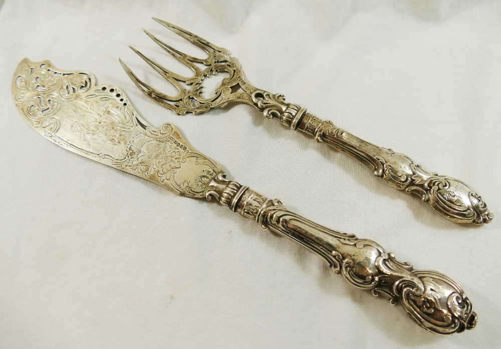 A pair of Victorian silver fish servers, Birmingham 1854 by Hilliard and Thomason,