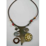 An Italian large mixed media pendant necklace, suspended from a leather chord, stamped '925',