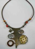 An Italian large mixed media pendant necklace, suspended from a leather chord, stamped '925',