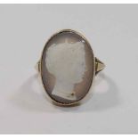 A 19th century carved hardstone cameo ring, featuring the profile of the head of a woman,