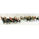 A collection of Britains mounted Lifeguard figures and the Lifeguard mounted band,