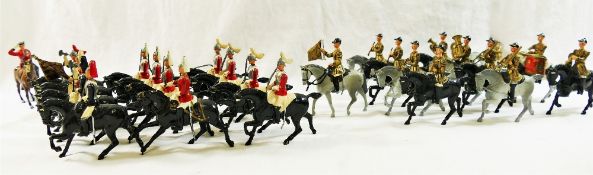 A collection of Britains mounted Lifeguard figures and the Lifeguard mounted band,