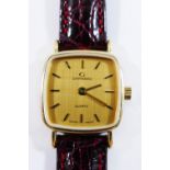 A Garrard ladies wrist watch, housed in yellow metal case,