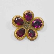 A 19th century garnet and diamond gold flower head,