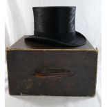 A vintage French black silk top hat,