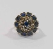 A sapphire and clear stone dress ring,