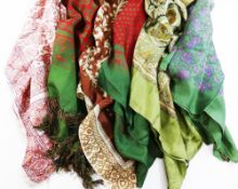 Six vintage English silk scarves, all with a paisley design,