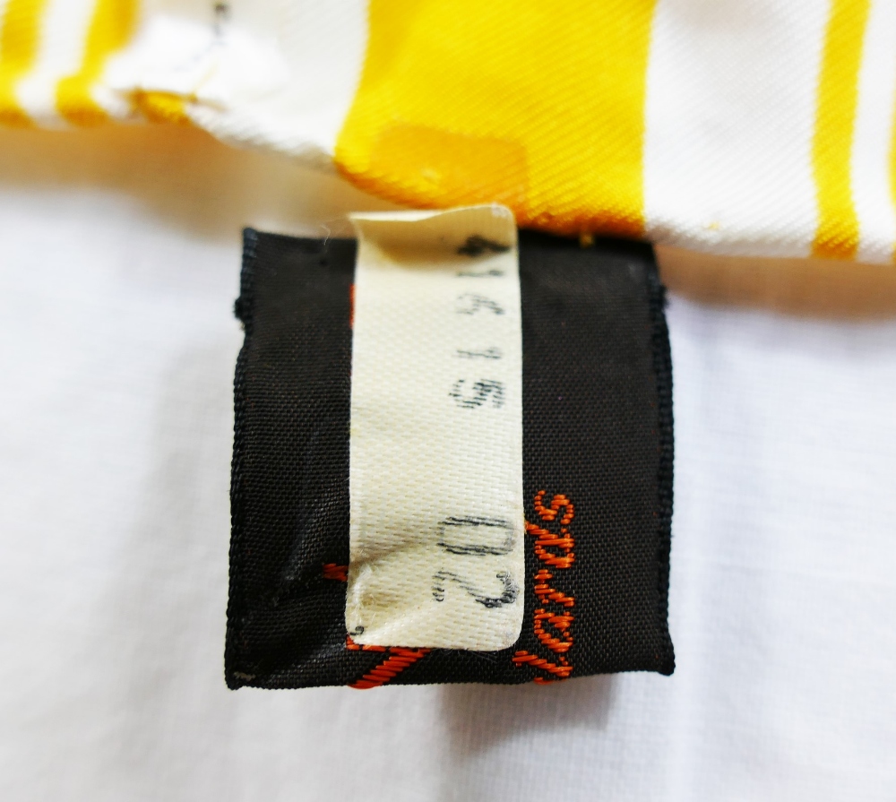 An Yves Saint Laurent yellow and white silk scarf with crossed thread pattern and YSL monogram to - Image 4 of 4