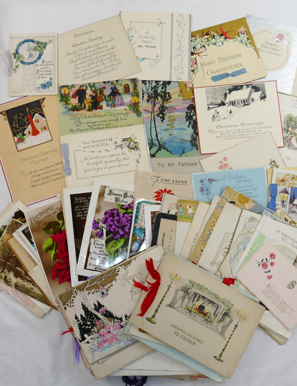 A collection of approximately 100 early 20th century and later greetings and other cards including