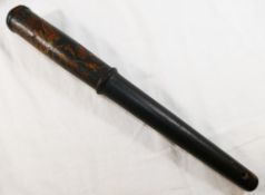 A George III black painted wooden truncheon, of tapered form,