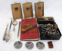 A quantity of miscellaneous items including three silver plated easel back small picture frames,