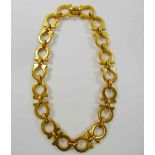 An Italian Salvatore Ferragamo gold plated gancini link necklace, with maker's mark to clasp,