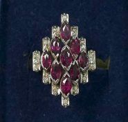 A ruby and diamond cluster ring, the nin