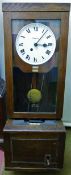A Simplex oak cased clocking in clock, n