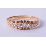 An antique 18ct diamond 'boat' five stone ring, size M.