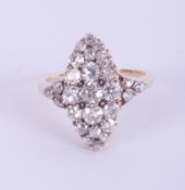 An 18ct yellow gold diamond marquise style ring, size R 1/2.