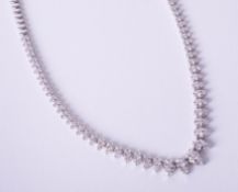 A fine 18ct white gold diamond fringe necklace.