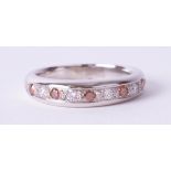 A platinum half band eternity ring set with fire opals and diamonds, size U, heavy gauge,