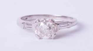 A platinum diamond solitaire ring, 1.21 carats, colour H, clarity SI 2, Old Cut, with EDR diamond